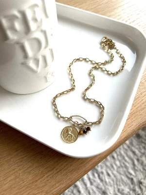 COLLIER LION CHAINE ET OEIL DE TIGRE