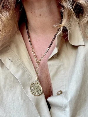 collier balance quartz fumé