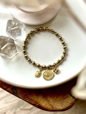 bracelet protection breloques porte bonheur hématites or